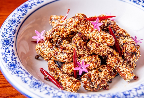 Crispy beef with dried chilli, cumin and sesame seeds
